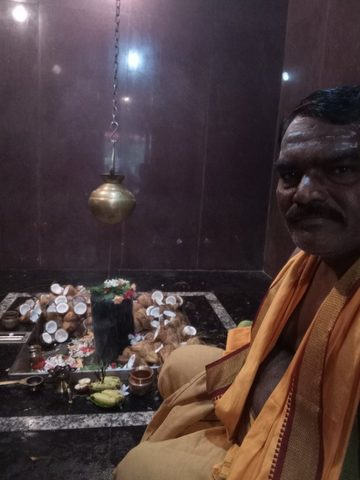 నారికేల అభిషేకం, photo from Koneti Narasinga Rao